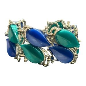 Vintage thermoset blue & green leaves. Silver tone, fold over clasp. JB5